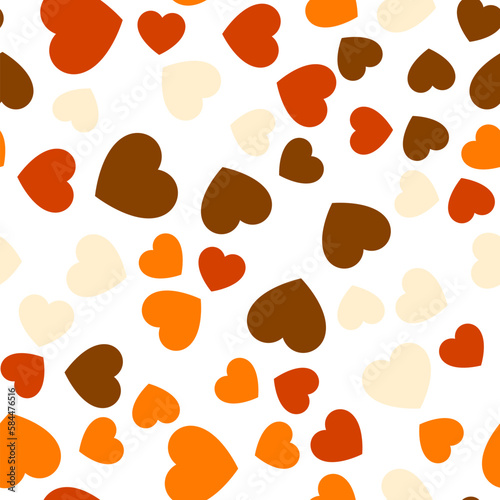 Colorful seamless pattern of red, orange, light and dark brown hearts. Suitable for printing on textile, fabric, wallpapers, postcards, wrappers