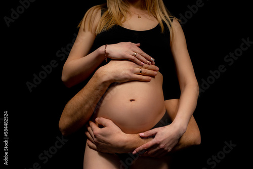 woman holding her belly