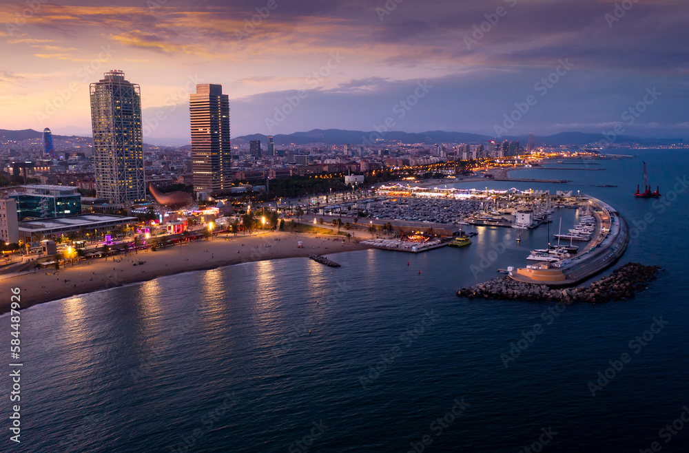 Obraz premium Top view of the evening Barcelona, the capital of the autonomous region of Catalonia, located on the Mediterranean coast, ..Spain