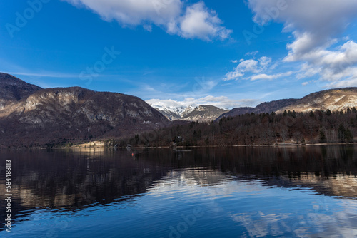 Lake Bohinj in winter in Slovenia against the background of the snowy Alps © Vlad