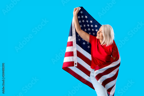 Mature woman with USA flag ...