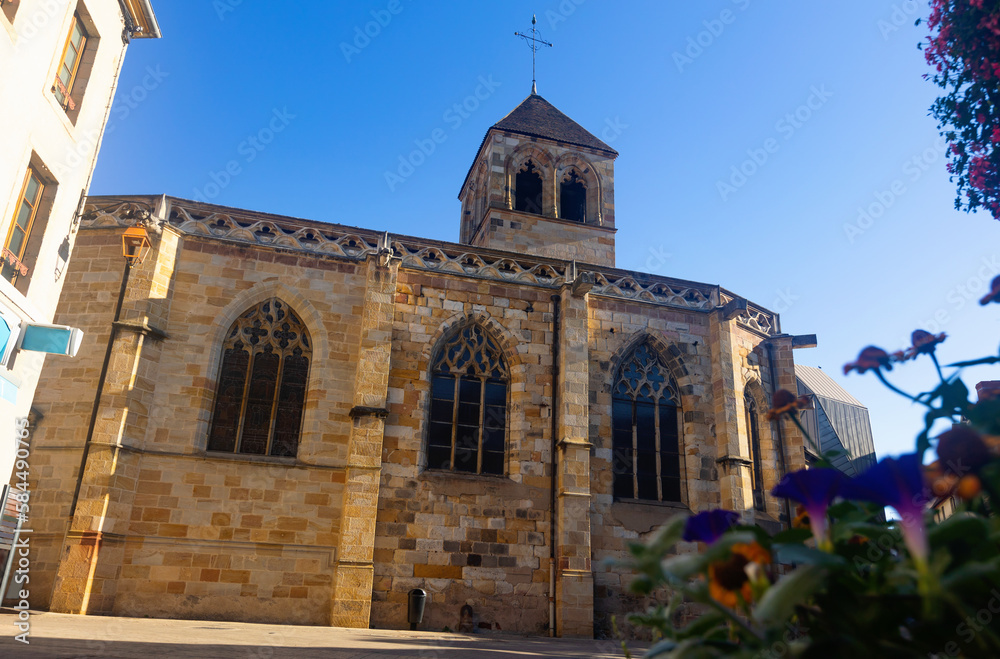 Church of Notre-Dame of Montlucon from outside during daytime. Allier department, central France.