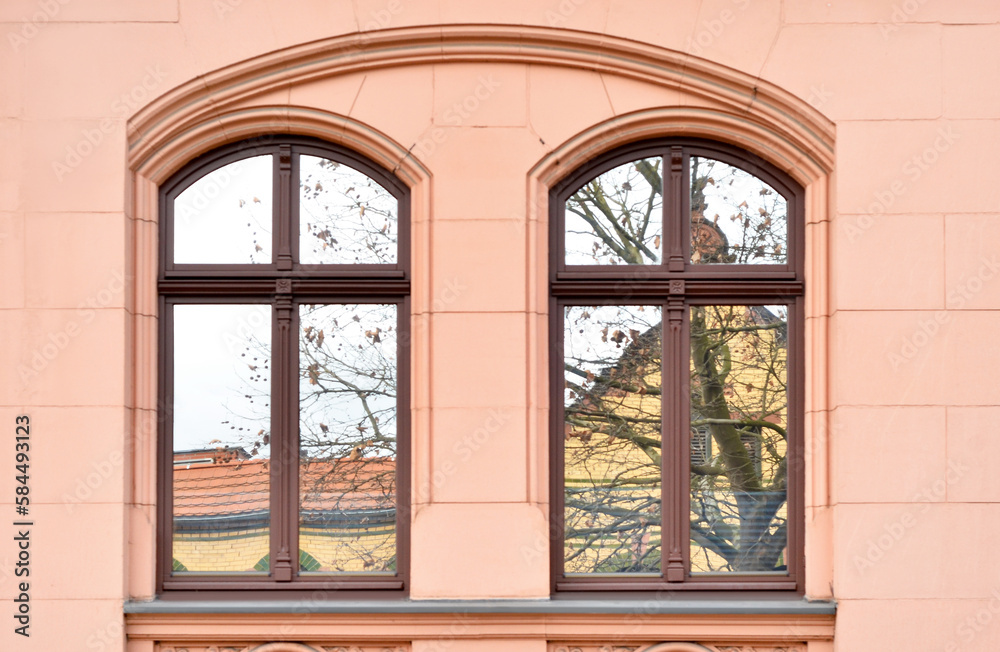 View of beautiful building with wooden windows View of beautiful building with wooden windows