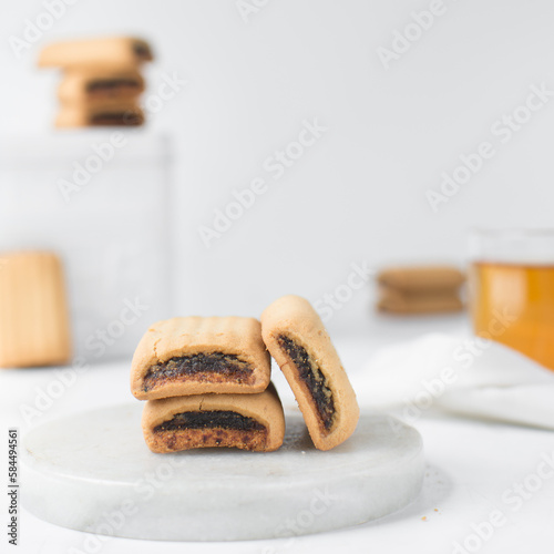 Date filled sugar cookies, homemade vanilla sugar cookies with a date filling, date bar cookies, homemade maamoul cookie bars photo