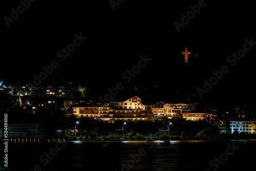 Cruz de Puerto Varas y costanera nocturna. photo