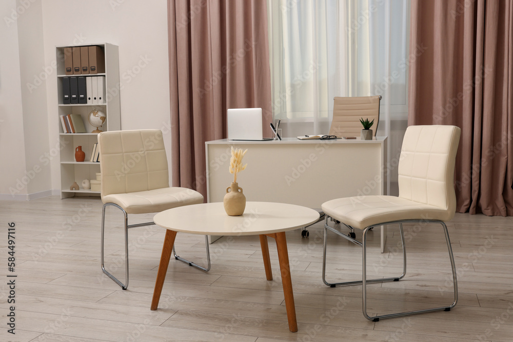 Modern office with comfortable waiting area and reception desk. Interior design Modern office with comfortable waiting area and reception desk. Interior design