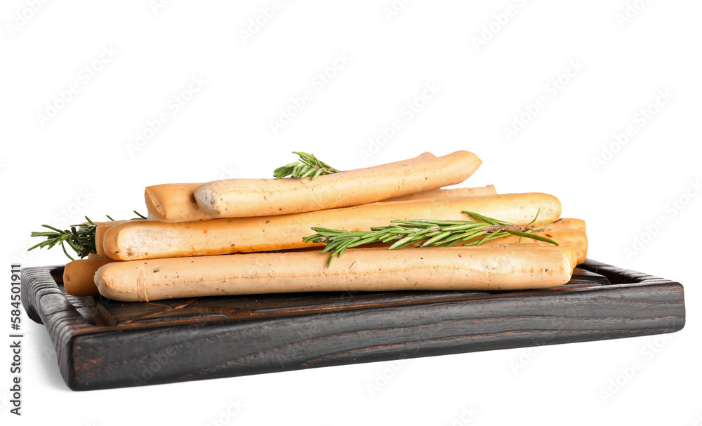Wooden board with tasty Italian Grissini on white background Wooden board with tasty Italian Grissini on white background