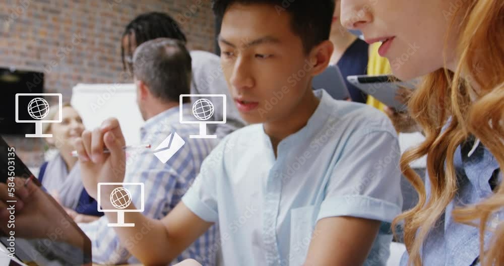 Animation of screen with globe icons and data processing over diverse business people in office Animation of screen with globe icons and data processing over diverse business people in office