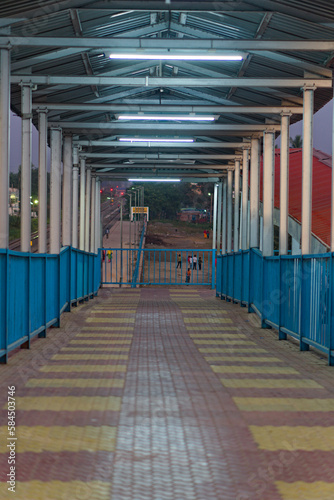 Photography an empty'rail over bridge in night time