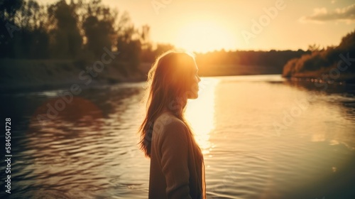 Woman standing and breathed fresh air at the river in sunset, Freedom concept. Len flare effect. Sunbeams. Enjoyment. Generative AI. © Pro Hi-Res