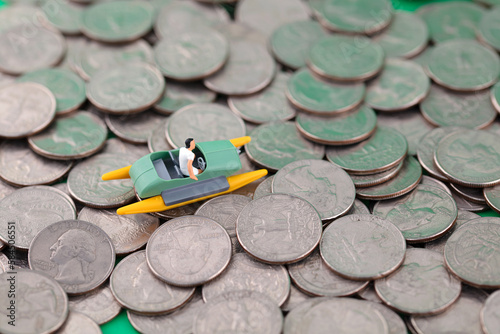 Microfilming the motorboat on a coin background photo