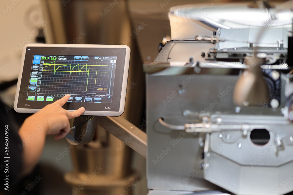 Fototapeta premium Coffee beans in roasting machine