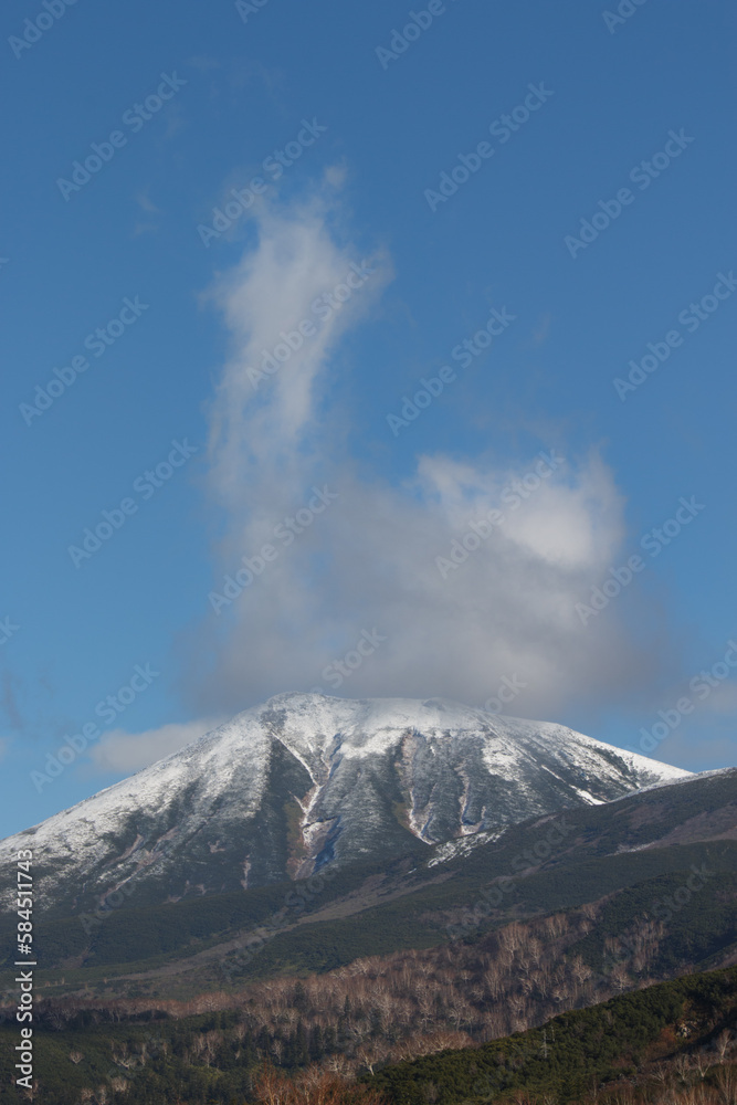Snow-capped mountain and cloud, Tokachi, Japan