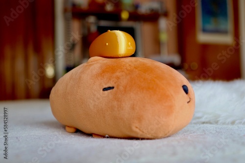 3d printed capybara on top of capybara plush