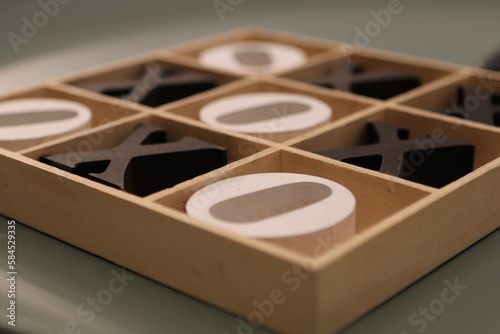wooden tic-tac-toe board game