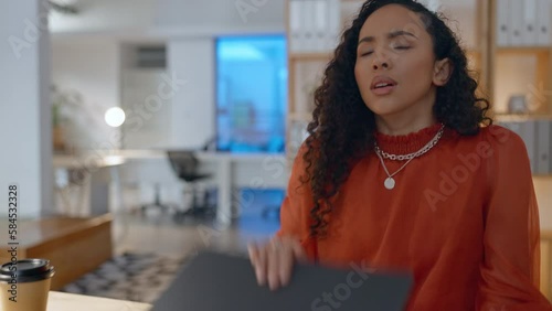 Black woman, laptop and headache in stress, financial crisis or debt looking at paperwork in frustration at home. Upset African American female freelancer in remote work on computer with bad news photo