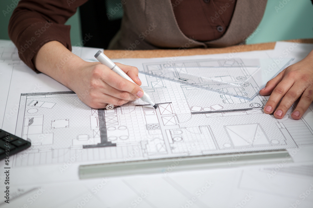 Details shot of architect blueprints on a desk. Business and creativity. Architecture job Details shot of architect blueprints on a desk. Business and creativity. Architecture job
