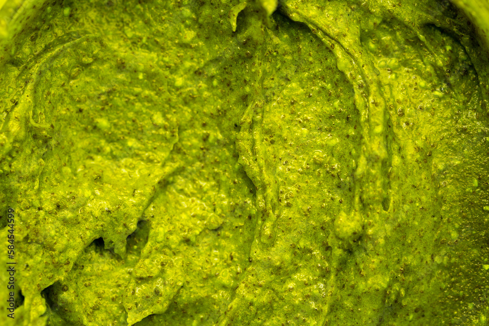 Smoothie with fresh green vegetables and fruits. Berry and yogurt ice cream. The texture of the sorbet. Delicious sweet dessert close-up as a background. Smoothie with fresh green vegetables and fruits. Berry and yogurt ice cream. The texture of the sorbet. Delicious sweet dessert close-up as a background.