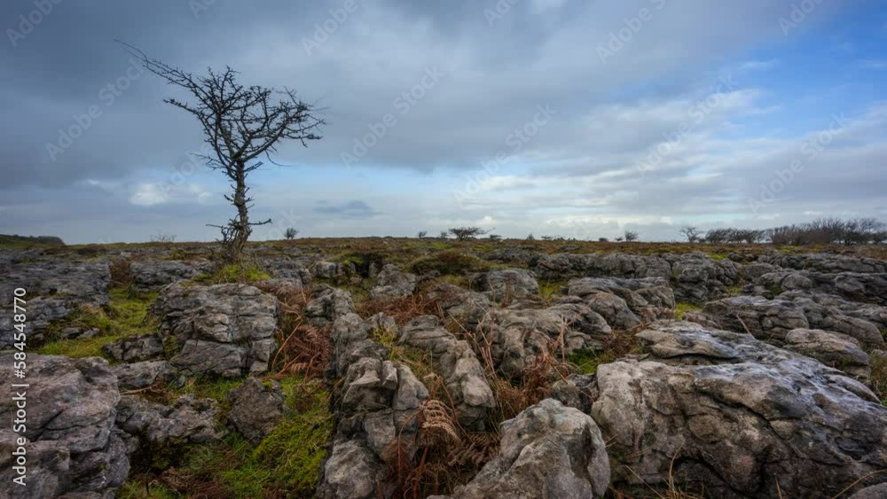 Timelapse of rural nature farmland with field ground rocks in the foreground during cloudy day viewed from Carrowkeel in county Sligo in Ireland. Timelapse of rural nature farmland with field ground rocks in the foreground during cloudy day viewed from Carrowkeel in county Sligo in Ireland.