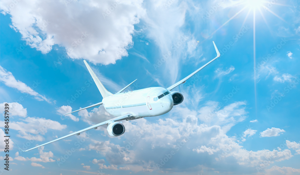 White passenger airplane flying in the sky amazing clouds in the background - Travel by air transport White passenger airplane flying in the sky amazing clouds in the background - Travel by air transport