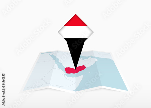 Yemen is depicted on a folded paper map and pinned location marker with flag of Yemen.