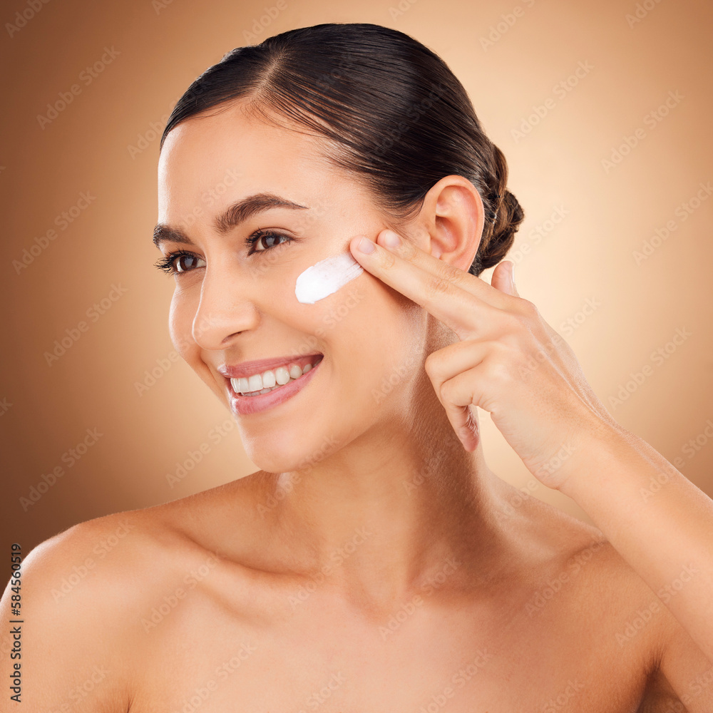 Skincare, lotion and woman face cleaning of a young person smile with cream in a studio. Happy, glow and dermatology beauty treatment of a female with cosmetics, spa and cosmetology luxury facial