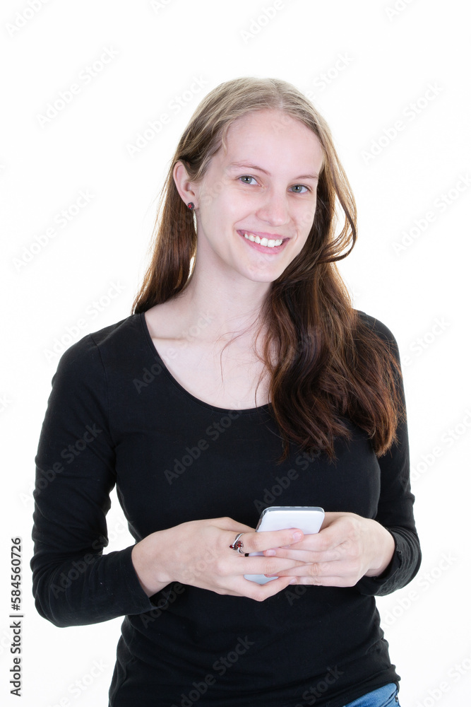Portrait of smiling young blonde caucasian woman using mobile phone texting on white background Portrait of smiling young blonde caucasian woman using mobile phone texting on white background