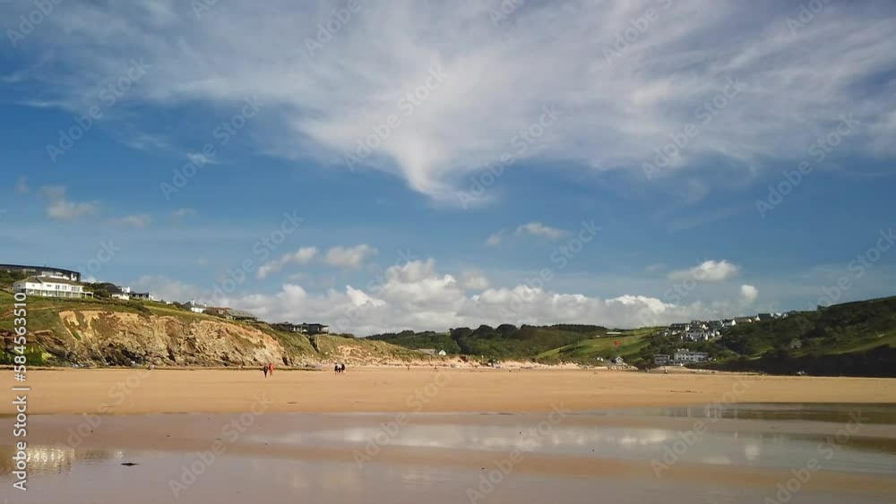 Mawgan Porth Beach, Cornwall - looking towards the dunes and hamlet. Real time, zoom out. Mawgan Porth Beach, Cornwall - looking towards the dunes and hamlet. Real time, zoom out.