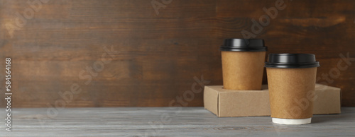 Blank paper cups, composition for delivery and take away concept, space for text photo