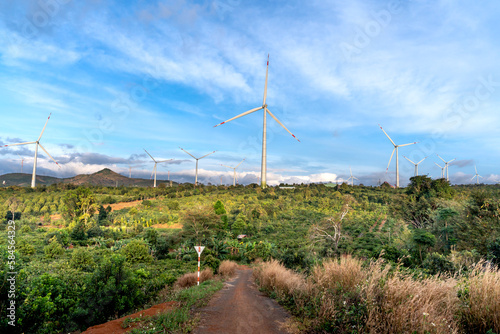 Wind power plant in the sunset in Ea H'Leo district, Dak Lak province, Vietnam