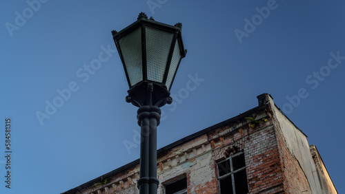STREET LANTERN - City landscape with an old building in the background