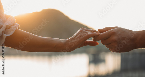 Couple in love. Love concept. Hands concept. People. Sensual. Photo. Sunset. Help. 