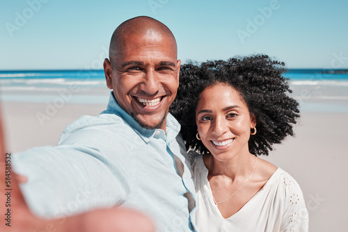 Couple, smile and selfie portrait at beach on vacation, bonding and care at seashore. Holiday love, summer ocean and man and woman taking pictures for social media, profile picture or happy memory.