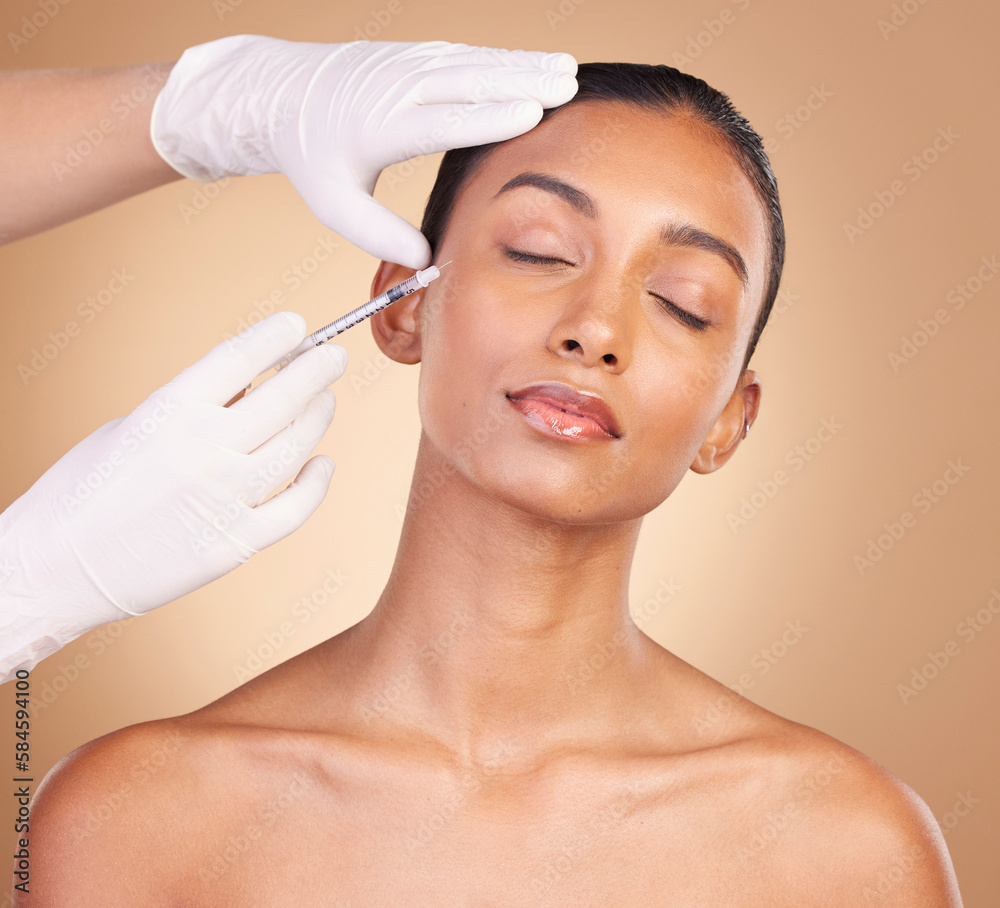 Woman, face and needle with beauty and dermatology, skincare with plastic surgery on studio background. Female, hands and skin injection, cosmetic procedure with facelift treatment and eyes closed