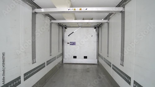 Empty semi trailer, perspective view, dolly zoom shot. Logistics and freight background
