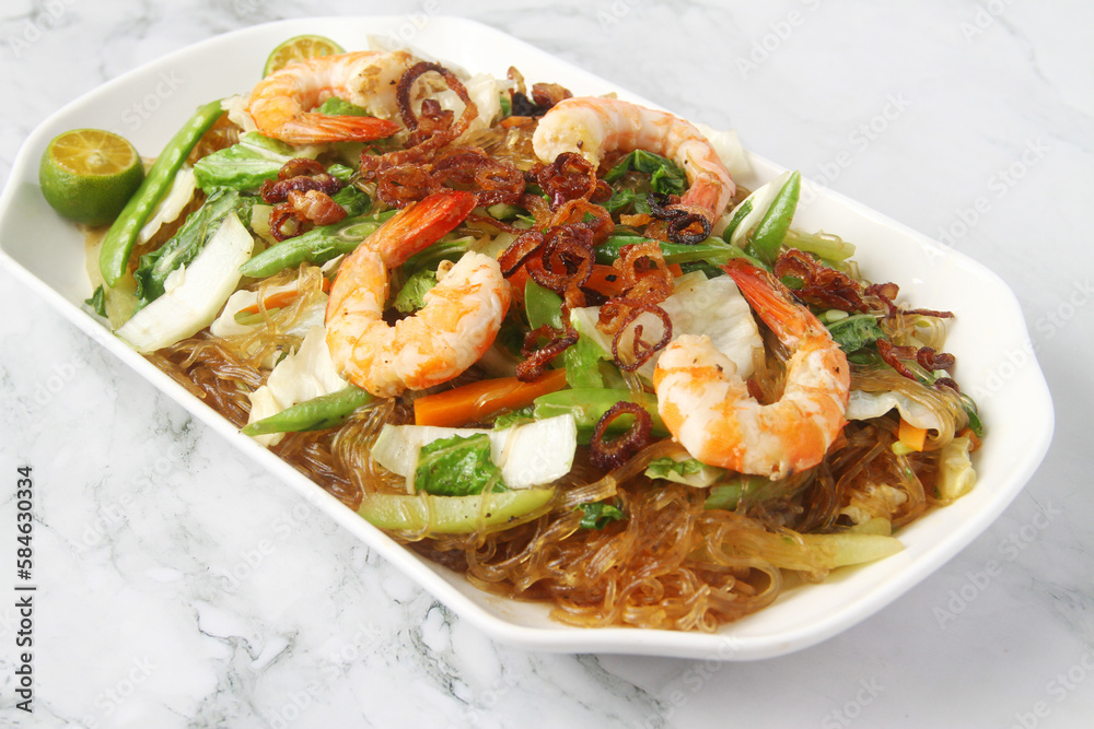 Freshly cooked Filipino food called Pancit Bihon with seafood Freshly cooked Filipino food called Pancit Bihon with seafood