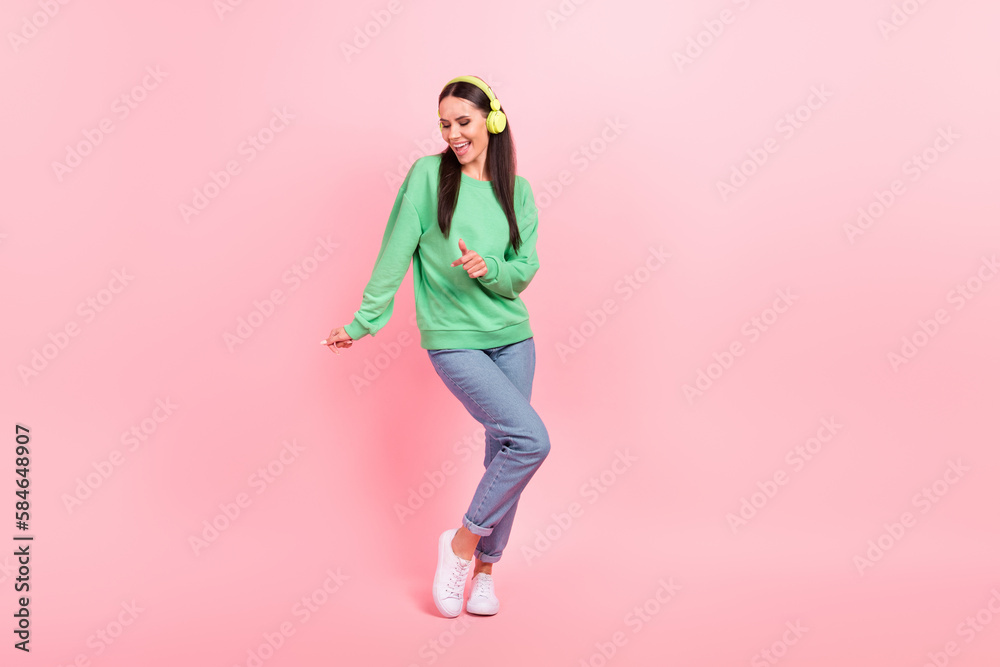 Photo of overjoyed positive lovely lady wear stylish clothes enjoy free time relax rest have fun isolated on pink color background