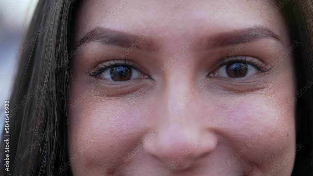 One Middle Eastern female person in her 20s closing eyes in contemplation. Meditative young woman smiling One Middle Eastern female person in her 20s closing eyes in contemplation. Meditative young woman smiling