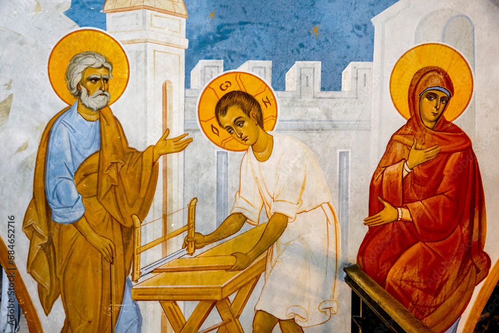 Fresco in the Greek orthodox church of the Annunciation, Nazareth, Israel. Jesus in St Joseph's carpentry workshop.