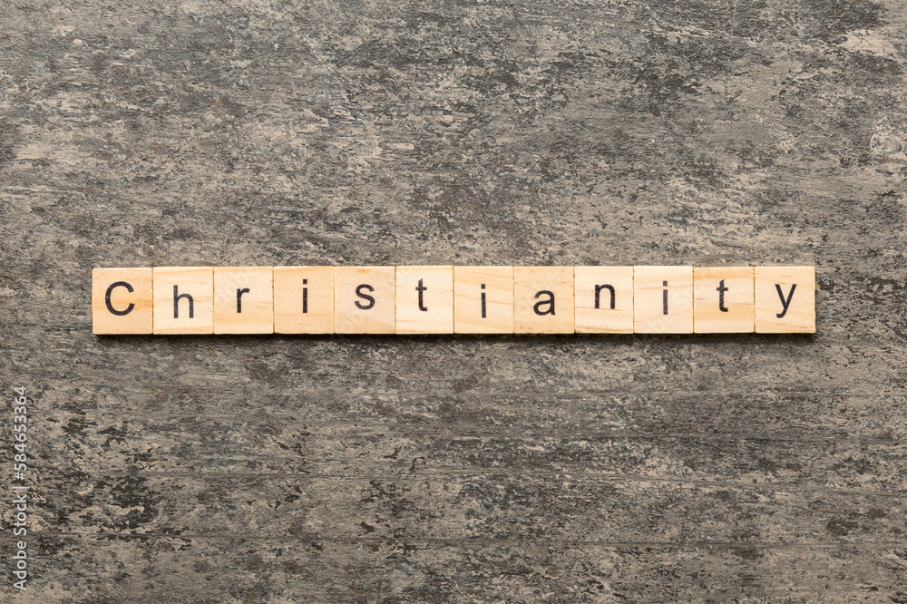 christianity word written on wood block. christianity text on table, concept christianity word written on wood block. christianity text on table, concept