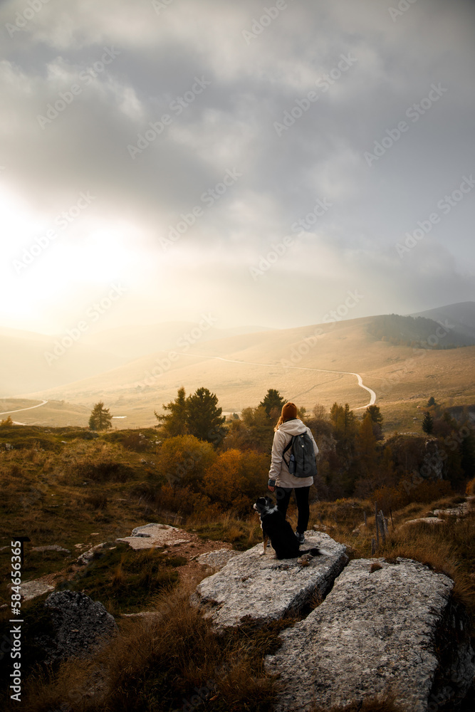 Women look at the sunset