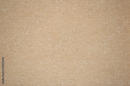 A beige fabric background texture full frame