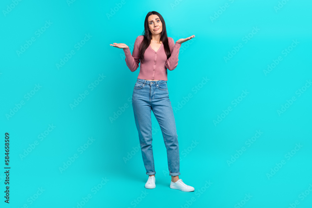 Full length photo woman youngster wear casual style shrug shoulders no idea confused staring dont know answer sorry isolated on cyan color background - obrazy, fototapety, plakaty 
