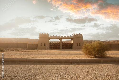 Fototapeta Naklejka Na Ścianę i Meble -  Abandoned palace gate in the desert