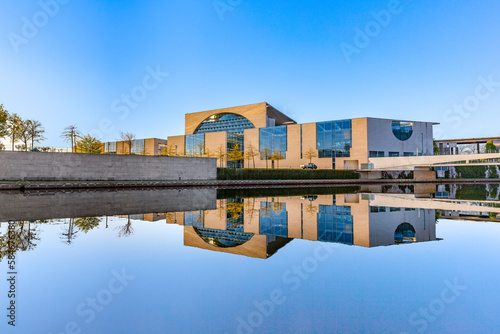 The german chancellery building at river Spree with reflection in early morning photo