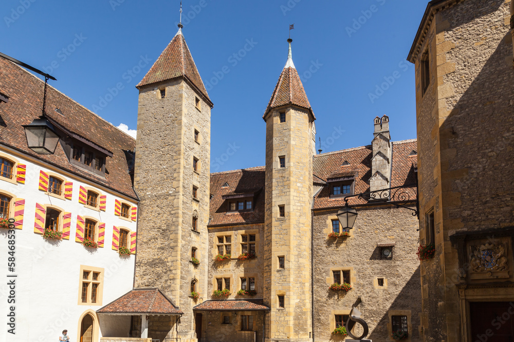 Outdoor View of Colorful Classic Castle Exteriors Walls and Windows in old town Neuchatel, Switzerland, Europe.
