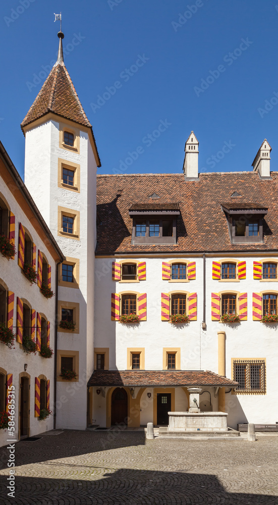 Outdoor View of Colorful Classic Castle Exteriors Walls and Windows in old town Neuchatel, Switzerland, Europe.