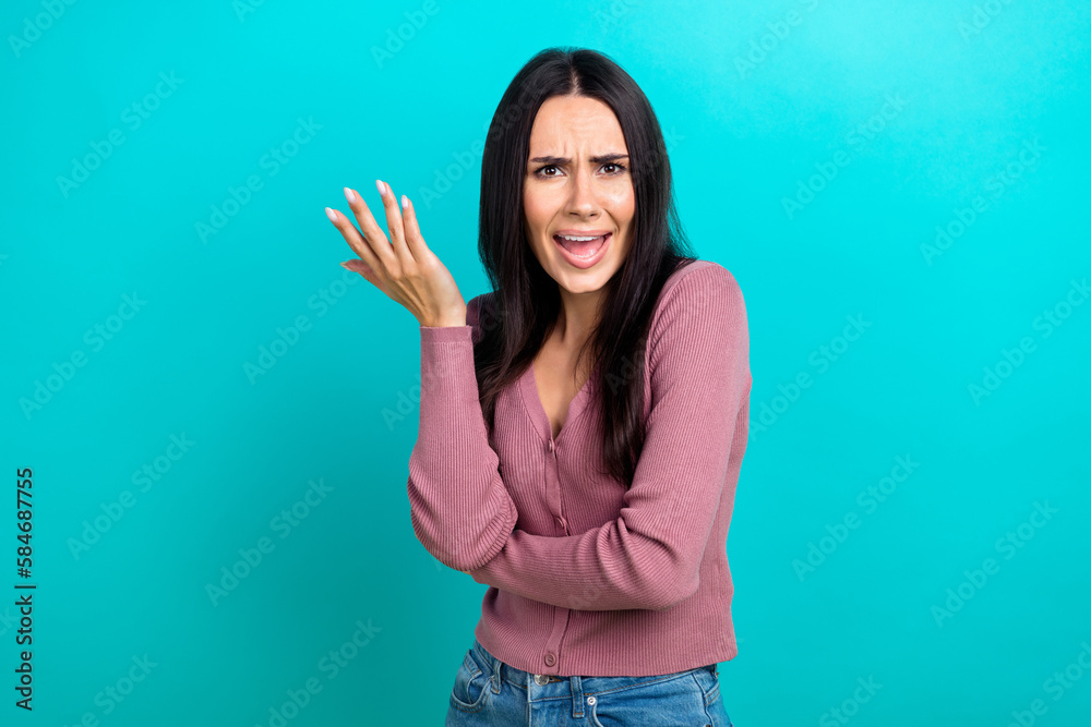 Portrait of sad upset angry woman with straight hairdo dressed pastel clothes protesting isolated on shine turquoise color background - obrazy, fototapety, plakaty 