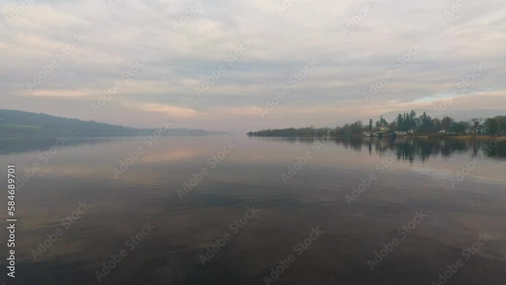 Misty scene over Lake Windermere in the English Lake District National Park. UK Misty scene over Lake Windermere in the English Lake District National Park. UK