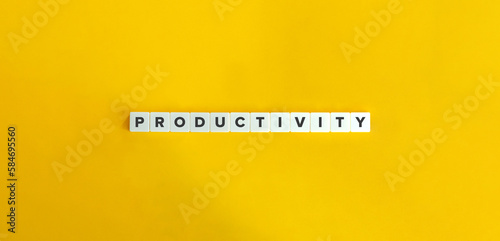 Productivity Word on Block Letter Tiles on Yellow Background. Minimal Aesthetics.